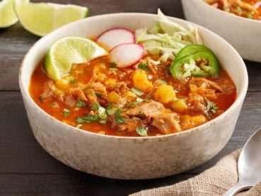 30 minute posole in a bowl topped with garnishes