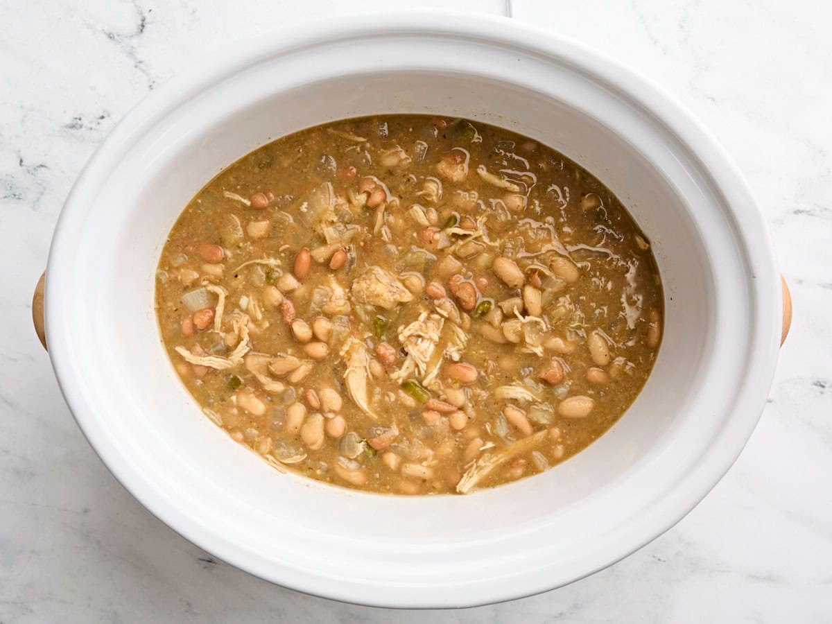Finished slow cooker white chicken chili in a crockpot.