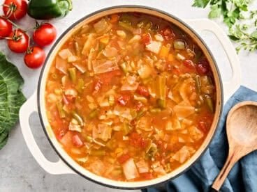 Overhead view of a pot of cabbage soup.