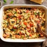 Overhead view of feta pasta in a baking dish.