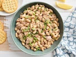 Overhead view of a bowl of tuna and white bean salad.