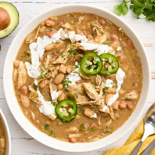 Overhead view of a bowl of slow cooked white chicken chili.